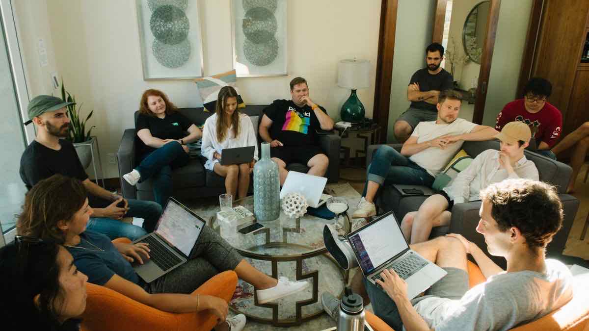 A diverse group of professionals together — the real people behind the public profiles an API returns