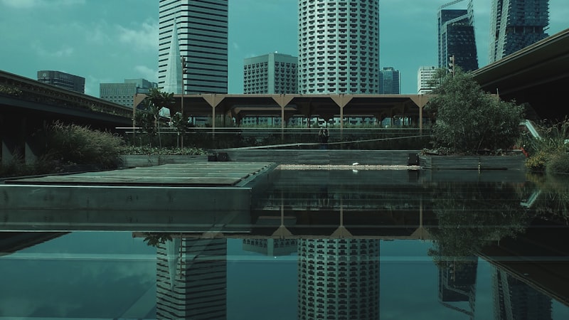City skyline reflected in still water creating a mirror duplicate, illustrating duplicate content competing for the same SERP positions