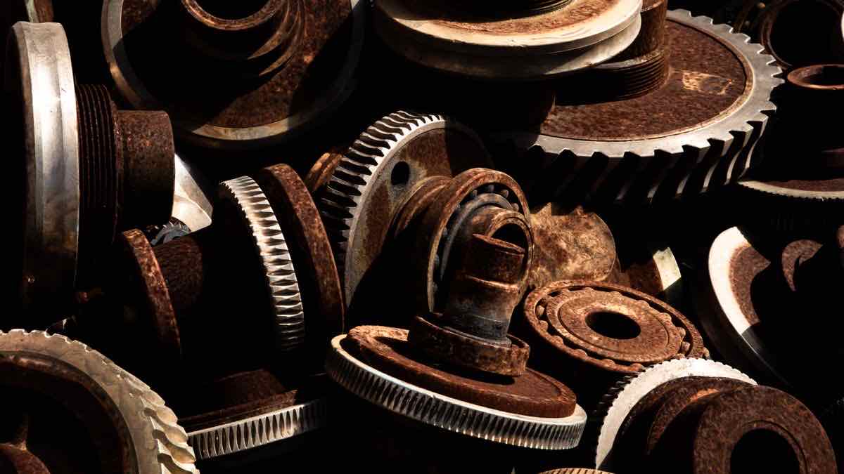 A single rusty gear with a blurred background — trying to scrape Google in Rust