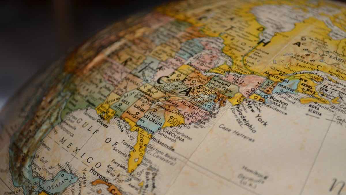 Close-up of a globe focused on the eastern United States, with New York visible